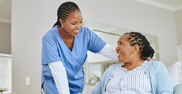healthcare professional assisting senior woman with care and support smiling together 2 compassionate moments